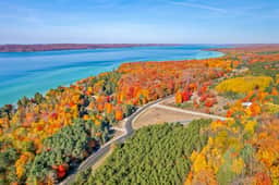Hilltop Home with Torch Lake Views - Image 4