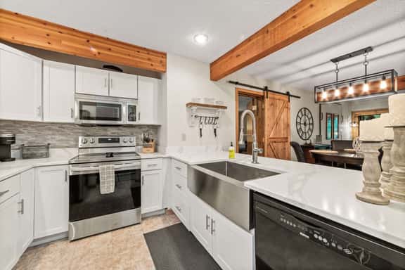 Shanty Creek Main-Level Condo | Golf Views • Near Ski & Torch Lake - Image 1