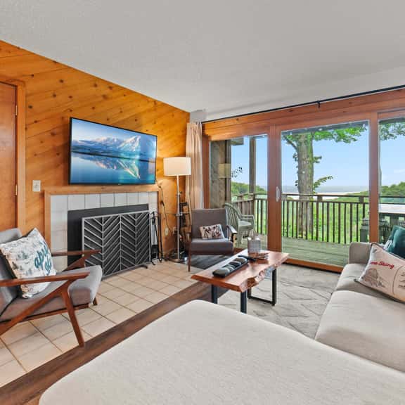 Lake Bellaire View Condo | Pool • Beach Club - Image 1