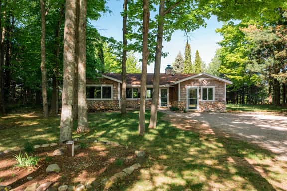 Hilltop Home with Torch Lake Views - Image 3
