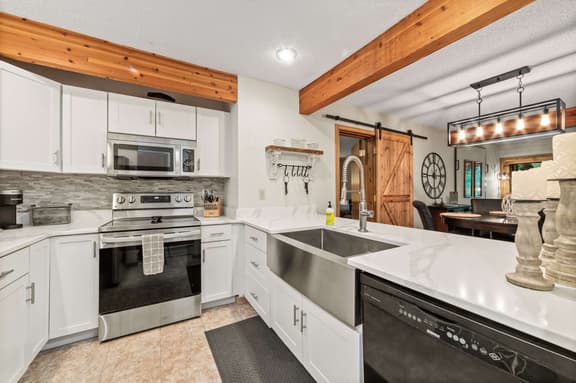 Shanty Creek Main-Level Condo | Golf Views • Near Ski & Torch Lake - Image 1